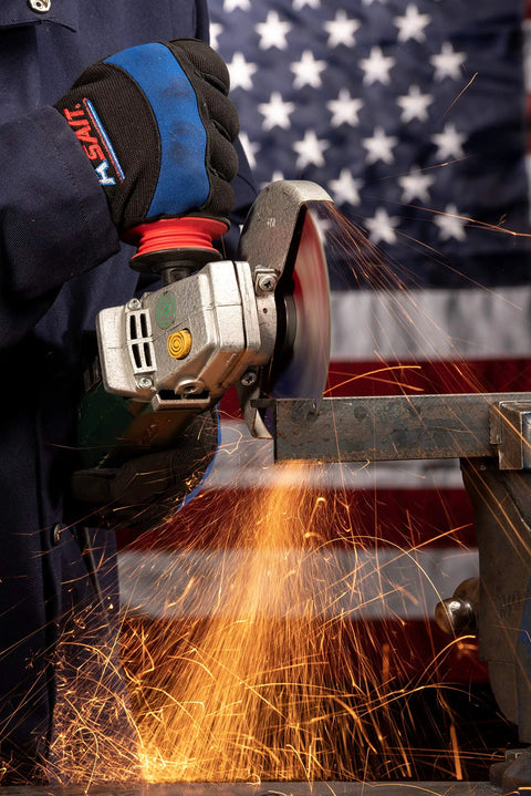 Person using angle grinder with Z Tech High Performance Cut Off Wheels 4 1/2 Inch By.045 Inch By 7/8 Inch Type 27 Type 42 for cutting metal