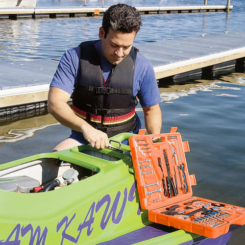 Man using 125 Piece Marine Tool Set in a Water Resistant Boat Tool Box Drop Forged Steel Chrome Plated for Rust Resistance Compact High Visibility Case