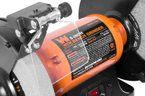 Eight Inch Bench Grinder Powered By A Beefy Four Point Eight Amp Motor Hitting 3450 RPM with adjustable eye guard and LED light.