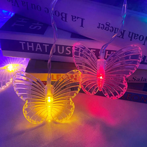 Close-up of USB powered Butterfly Curtain String Lights with Remote 48 LED Twinkle Lights 8 Modes in multi-colored glow