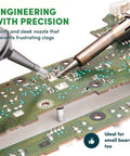 Close-up of Handheld No Power Needed Desoldering Sucker With Silicone Tip Self Cleaning Solder Vacuum Pump on circuit board