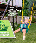 Child enjoying Deluxe High Back Bucket Toddler Swing With Pinch Free Design And Safe Chain, Triangle Guard, Green Outdoor Playset