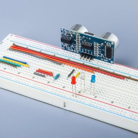 Solderless Prototype Breadboard Kit with 1x830 tie in grid showing mounted components and jumper wires for DIY prototyping