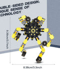 Yellow and black transformable fidget spinner from 20-piece set with chain robots, DIY deformed mechanical spiral spinners for stress relief.