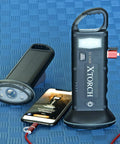 Rechargeable Solar Powered Flashlight Lantern For Camping And Outdoors USB And Solar Charging Emergency Power Bank, showing USB connection to a phone