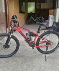 Retractable Aluminum Bike Rear Rack Cargo Carrier for Bicycle Luggage mounted on red mountain bike