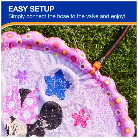 Minnie Mouse Splash Pad For Kids With Built In Sprinklers, The Sickest Outdoor Water Toy For Summer Fun, Disney Pool Party Essential For Ages 1 And Up, Pink Floral Pattern, Quick Setup For Nonstop Splash with hose connected on lawn.