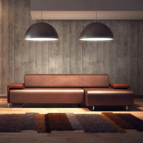 Modern living room with brown sofa under pendant lights and wooden wall backdrop