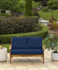 Outdoor Loveseat Cushion Set 3-Piece With 2 Back Pillows And 1 Bottom Cushion, 48 By 24 Inches, Sapphire Blue, Water Repellent And Fade Resistant, Eco-Friendly PFAS-Free Polyfill From Recycled Bottles on wooden loveseat in garden setting