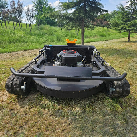 Remote Controlled Lawn Mower For Slopes And Rough Terrain, Heavy Duty Tracked Grass Cutter on grassy orchard terrain