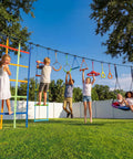 Children playing on 50 Ft Ninja Warrior Obstacle Course Swing Set With Slackline And Saucer Swing For Backyard Epic Playtime