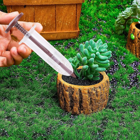 Using Portable Handy Ergonomic Seed Spreader And Seeder Tool for Lawn And Garden near potted plant