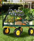 Heavy Duty 1500 Lbs Capacity Mesh Steel Garden Cart With Folding Removable Sides On Wheels loaded with flowers and plants