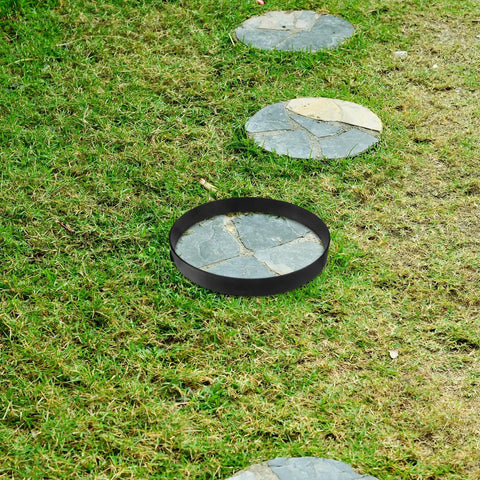 Round Stepping Stone Mold For Concrete Pathways Reusable Plastic Paver Forms DIY Garden Walkway Maker placed on grass