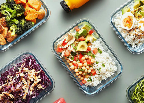 Top view of 10 Pack Glass Meal Prep Containers With Lids Airtight Snap Locking Lids Clear Borosilicate, filled with diverse meals.