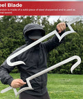 Person holding Chinese Hook Swords Set For Wushu And Martial Arts Training, 33 Inch Durable Alloy Blades outdoors in martial arts stance