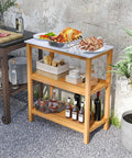 Outdoor Wooden Sideboard With Marble Look Countertop And Three Tier Acacia Buffet Organizer For Patio Yard Ready Potting Bench And Plant Stand For Backyard Garden And Deck Entertaining And Storage, featuring acacia wood and loaded with food and drinks.