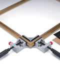 Quick-Jaw Right Angle Corner Clamp for Cabinets and Boxes, securing a wooden frame with ergonomic handles and a 3-inch jaw face.