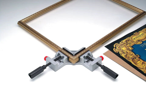 Quick-Jaw Right Angle Corner Clamp for Cabinets and Boxes, securing a wooden frame with ergonomic handles and a 3-inch jaw face.
