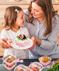 Heavy Duty Square Aluminum Foil Cake Pans 50 Pack Hot Pink 10oz with secure lids, mom and child enjoying desserts together.