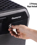 Fireproof And Waterproof Lock Box With Key Lock, Rugged File Safe for Docs, 0.66 Cubic Feet, hand inserting key