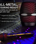 V7 MC1 Wireless Microphone Capsule For Shure Transmitters on mixing console, rugged all-metal zinc alloy body, black and red grille.
