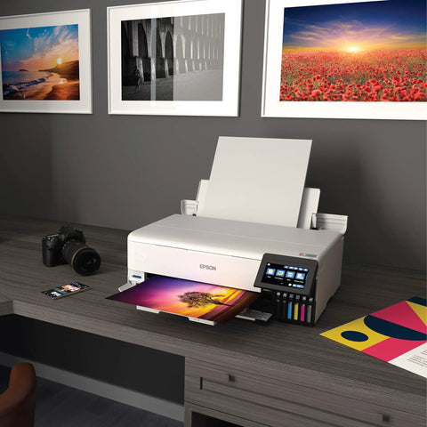 EcoTank Photo ET-8550 Wireless Wide-Format All-In-One Supertank Printer on desk, printing a photo, with 4.3-Inch Color Touchscreen