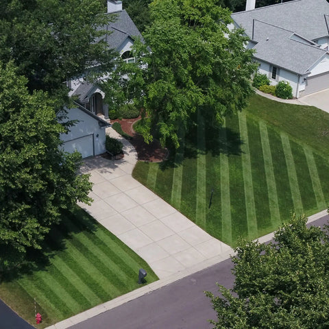Aerial view of striped lawn created by Generation 3 Lawn Striping System For 21 Inch Walk Behind Mowers Stripes Like A Ballpark