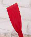 Close-up of red Six Pack Plastic Putty Knife Set With 1.5 To 6 Inch Flexible Solvent Resistant Scrapers for Spackling
