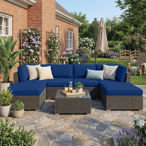 Patio with rattan furniture featuring Waterproof Outdoor Cushion Covers For Patio Furniture, 8 Piece Navy Solid Stretch Slipcovers.