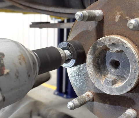 Using Wheel Stud Installer Tool For Cars And Light Trucks Quick Lug Nut Style Stud Puller to seat new stud with impact wrench