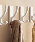 Heavy Duty Adhesive Wall Hooks 13Lb Aluminum No Damage To Wall Four Pack holding towel and board on smooth surface