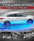 Car on road with blue glow from Aura Aluminum Car Underglow Lights With Remote Control, showcasing waterproof feature.