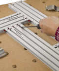 Dead On Heavy Duty Adjustable Variable Router Jig Kit 18X32 Inch Base with precision measuring tools on workbench.