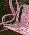 Side view of Kids 2 Seater Patio Porch Swing with Adjustable Canopy and Safety Belt, Pink Butterfly Pattern Hanging Swing Bench for Garden.