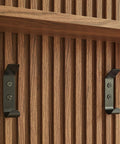 Mid Century Modern Fluted Walnut Wall Mount Coat Rack Panel with sturdy hooks against wood grain backdrop.