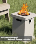 Portable Square 14 Inch Smokeless Fire Pit Table For Outdoor Patio And Backyard Heating 10000 BTU beside bench on grass.