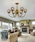 Gold 6-Light Sputnik Chandelier With Glass Shade in modern farmhouse living room setting