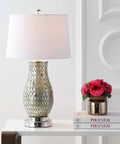 Dope Green Mosaic LED Table Lamp With Iron Base And White Linen Drum Shade Coastal Traditional Style Nickel Accents UL Listed LED Bulb Included 28 Inch Tall on a white table with books and flowers