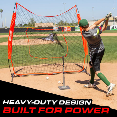 Man hitting baseball into 7 Ft X 7 Ft Baseball And Softball Practice Net With Bow Frame Carry Bag And Strike Zone