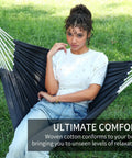 Person relaxing on 2 In 1 Hammock With Stand Portable Hammock And Swing Chair No Tools Assembly Carry Bag Indoor Outdoor Use For Patio Garden