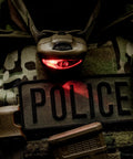 Vizz Headlamp 550 Lumen Dimmable LED in tan on tactical vest with police patch