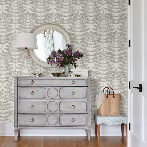 Room with Grey Terrain Botanical Peel And Stick Wallpaper With Scandinavian Influence behind grey dresser and floral decor, NUS3263.