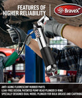 Bravex pistol-grip grease gun with 18-inch hose, 6000 PSI, chrome body and black ribbed grip in use