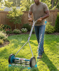 7 Blade Reel Mower With Sharpener For Fine Textured Lawns 16 Inch Cutting Width Lightweight Manual Grass Cutter For Bentgrass Bermuda Zoysia Includes SK 2 Hand Sharpener For Slick Pro Quality Lawn Care. Man using 16-inch reel mower on lawn