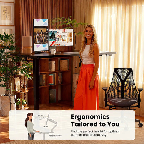 Woman using Electric Height Adjustable Sit Stand Desk 48 By 24 Inches with Memory Presets, Quiet Lift, Ergonomic Home Office Table in Black