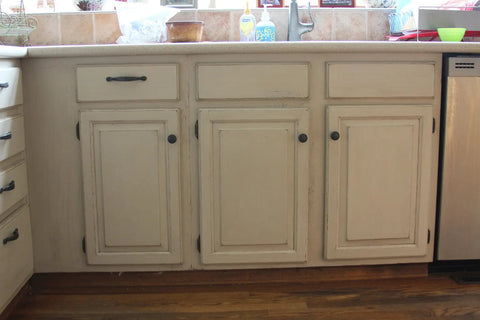 Top Tier Paste Wax For Wood And Cabinet Surfaces With Real Beeswax Blend on aged kitchen cabinets.
