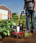 Person using Cultivator With 43Cc 2 Cycle Viper Engine 6 To 10 Inch Adjustable Width 8 Inch Maximum Depth for soil aeration