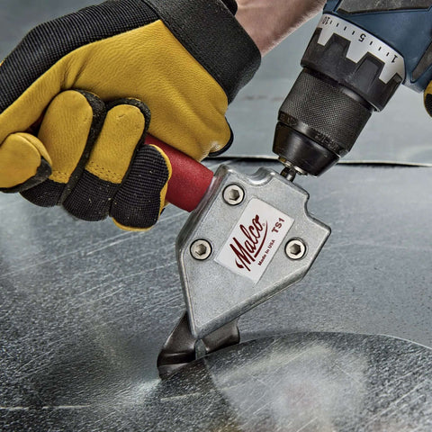 Turbo Sheet Metal Shear Attachment for drills in use, cutting metal with lightweight aluminum head, attached to cordless drill, 20 gauge capacity