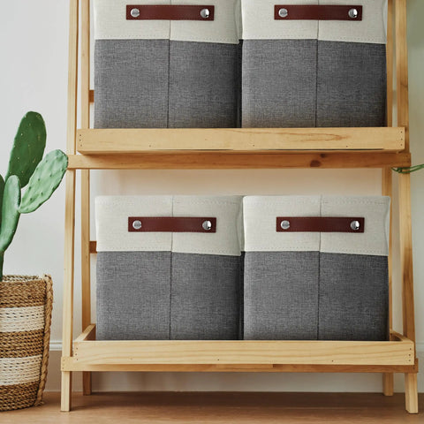 Fabric Cube Storage Bins Four Pack 10 Inch By 10 Inch Gray And White Foldable Storage Cubes arranged on wooden shelves